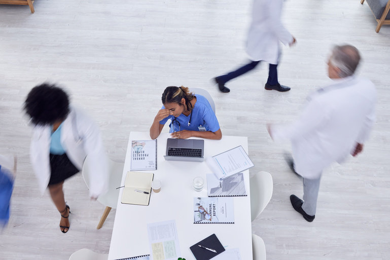 Modern hospital building in Dubai with healthcare professionals